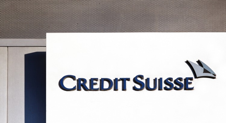 Credit Suisse Credit Suisse logo on a white wall of building.