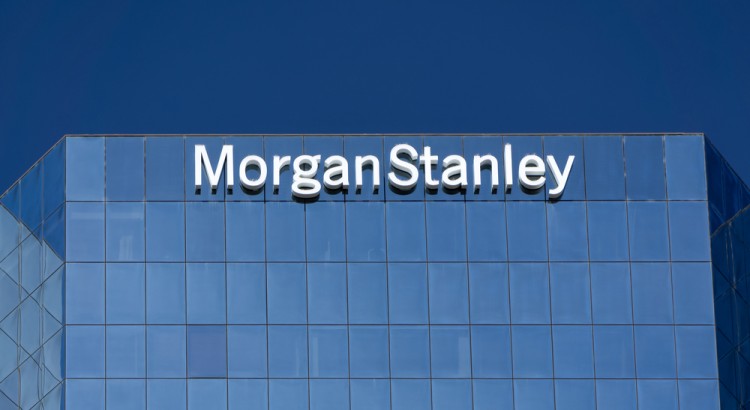 Glass Morgan Stanley building against a blue sky.